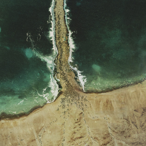 A fake aerial view of Moses and the Israelites walking through the Red Sea.