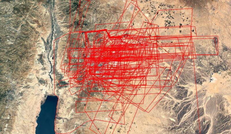 A satellite image shows polygons around modern Amman.