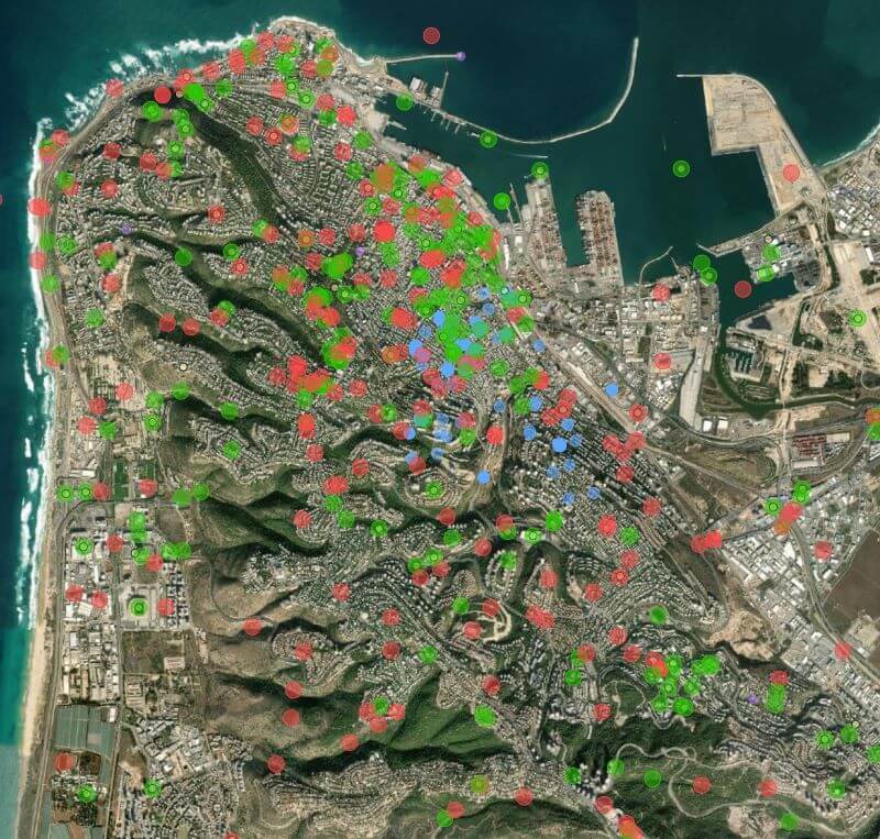 Satellite view of the area around Mount Carmel overlaid with dots showing photo and article locations.