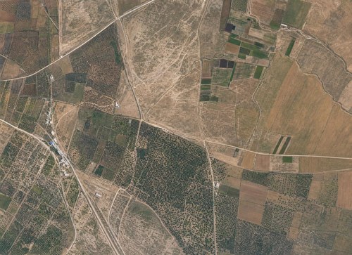 Archive record 208b: Northwest of er-Ramle: overview of the terrain as far as the village of Sarafand, 4 km of the Jaffa-Jerusalem road, and the railway junction toward Jerusalem and Gaza