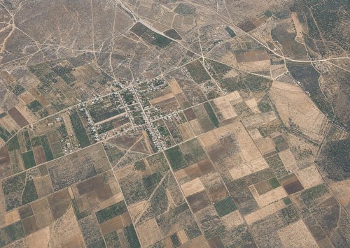 Archive record 283a: Rehovot colony, with Khirbet el-Bedd to the north, a pond to the west, and 1.5 km of surrounding terrain to the east
