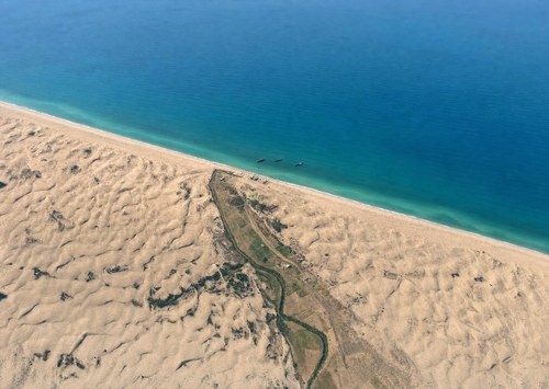 Archive record 359b: mouth of the Wadi Sukrer with sand dunes north of and south of