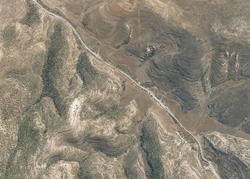Archive record 734: Road from Latrun to Jerusalem: Jerusalem road east of Bab el-Wad, with mountain terrain to the north and south