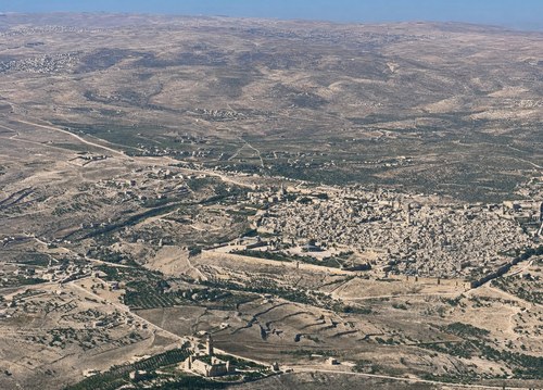 Archive record 776: A. General views: Jerusalem seen from northeast to southwest, oblique photograph from low altitude; in the foreground, the Mount of Olives with the Augusta Victoria Foundation