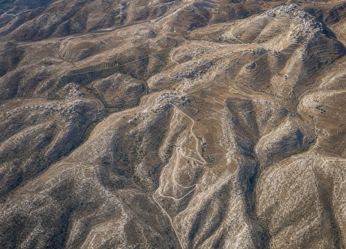 Archive record 843: el-Azarije, Jericho road, Khan Hatrur, Khan el-Meschrab, Deir el-Kelt, Jebel Karantal, etc.: overview from east to west over the entire terrain east and south of Jerusalem (oblique photograph): in the foreground, the switchbacks of the Jericho road east of el-Azarije; in the middle ground, el-Azarije, Abu Dis, and et-Tur on the Mount of Olives; almost like no. 842, without the Kidron and Jerusalem