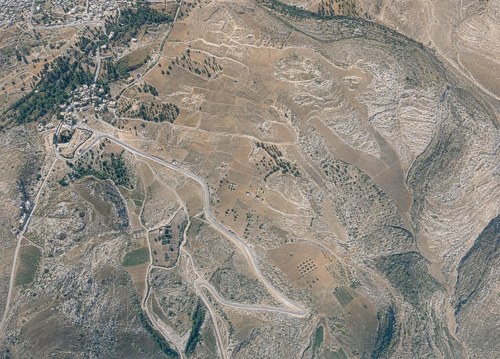 Archive record 847: el-Azarije, Jericho road, Khan Hatrur, Khan el-Meschrab, Deir el-Kelt, Jebel Karantal, etc.: eastern part of el-Azarije with the switchbacks of the Jericho road and eastern surroundings