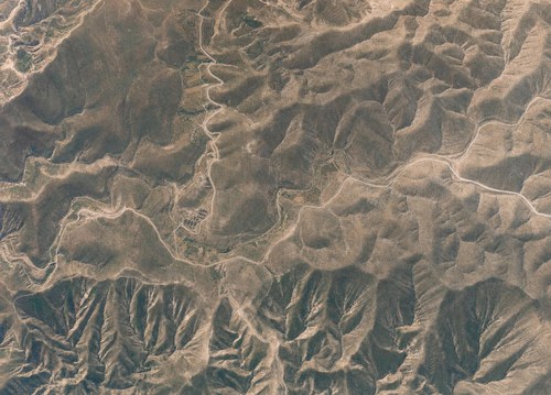 Archive record 867: el-Azarije, Jericho road, Khan Hatrur, Khan el-Meschrab, Deir el-Kelt, Jebel Karantal, etc.: overview of the surroundings of Khan el-Meschrab near the junction of the new Nebi Musa road (arrow reversed)