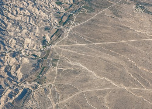 Archive record 893: el-Azarije, Jericho road, Khan Hatrur, Khan el-Meschrab, Deir el-Kelt, Jebel Karantal, etc.: Eintritt the Nebi Musa road in the Jordan plain near Rujm esch-Schemalije, northern continuation of no. 891