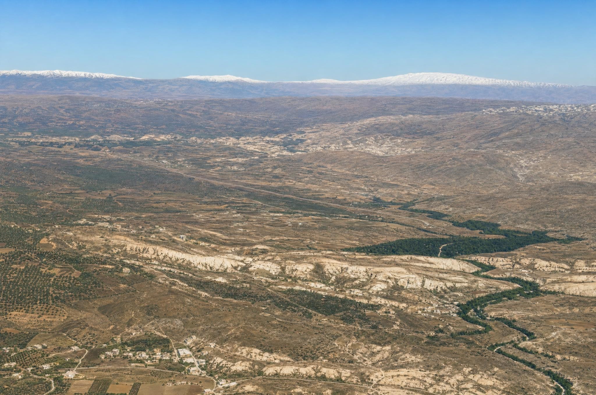 The Barada depression with the Anti-Lebanon and Lebanon. View toward the southeast.
