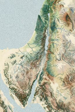  A terrain map where tiny, tight dots form mountains, rivers, and valleys — dense dots for ridges, lighter dot fields for plains — using carefully chosen earthy tones (sands, greens, muted blues) to model the land naturally.