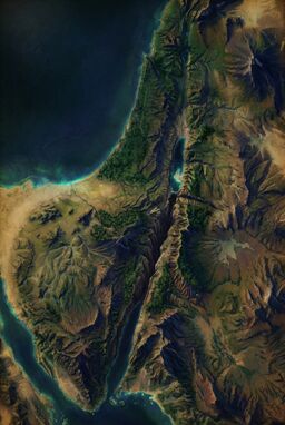  A heavily shaded, lush fantasy isometric terrain map — every mountain range casts long painterly shadows, valleys are carved deeply, sea edges glow faintly. Highly dramatic but fully geographic.