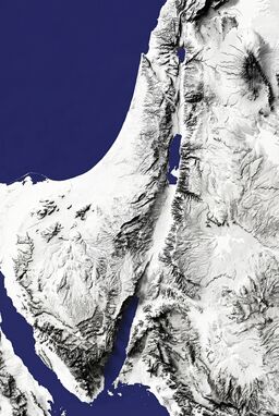  A stark black-and-white relief map — no unnecessary shading — just sharply rendered valleys and ridges, relying on shadow play for topographic depth. Looks like a high-end art print more than a traditional map. Use color sparingly to indicate water.