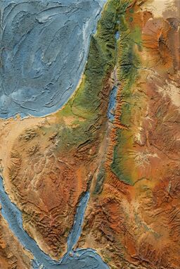  A map created from coarse, earthy pigments mixed into paint pastes — rusty ochres for deserts, gritty green for hills, silty blue for rivers — every stroke textured, granular, handmade.