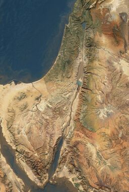  A clear, grounded map — precise, earthy, rugged — focusing on the unvarnished physical realities of the terrain. Rivers muddy and meandering, hills softly rolling or starkly dry, rendered with honest texture and muted natural colors.