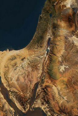  A clear, grounded map — precise, earthy, rugged — focusing on the unvarnished physical realities of the terrain. Rivers muddy and meandering, hills softly rolling or starkly dry, rendered with honest texture and muted natural colors.