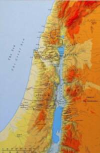 The map combines saturated hypsometric elevation tints with digital shaded relief, blue water bodies, black settlement dots, and dark route and boundary lines over a Levant regional base.