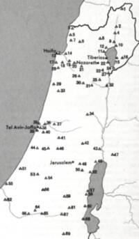 Monochrome flat atlas map with gray water areas, white land, black sans-serif place labels, numbered open-triangle archaeological site markers, and solid boundary and drainage linework.