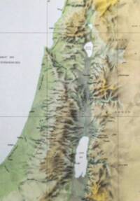Modern atlas relief map using colored hypsometric elevation tints with manual shaded terrain, pale water, thin graticule lines, and dark sans-serif labeling.