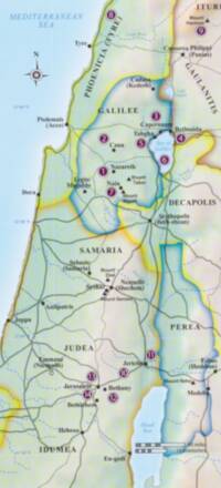 Map uses softly blended hypsometric elevation tints with colored boundary bands, dark serif place labels, and blue italic water labels.