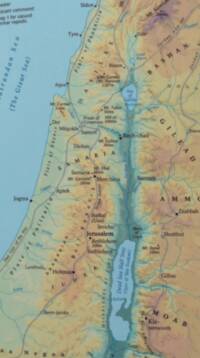Full-color shaded-relief Bible atlas style with hypsometric land tints, blue water, gray double-line roads, blue river network, and dense black serif place-name labeling.