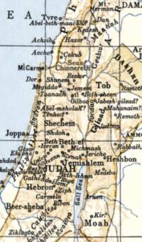 Relief is shown with dense manual hachures over a flat two-color base, with pale blue water, cream land, and dark brown-black typography and linework.