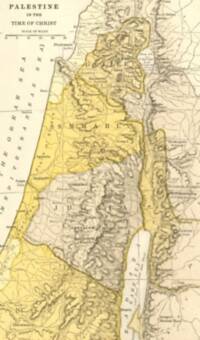 Sepia engraved-style map with manual hachured relief, pale cream land and water surfaces, yellow regional wash, and fine graticule lines.