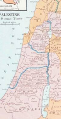 Flat pastel Bible atlas map with pale water, pink and peach political-region tints, dark gray-brown labeling, and a prominent blue-green boundary/water-line treatment.