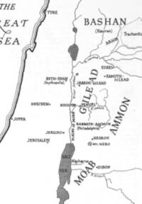 Monochrome flat map with white land and sea surfaces, dark ink labels, gray hatched inland waters, emphasized Mediterranean coastline, and labeled rivers in thin dark lines.