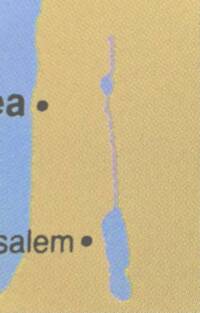 The visible crop uses flat tan land, blue water, and dark gray-black city labels with filled dot city symbols.