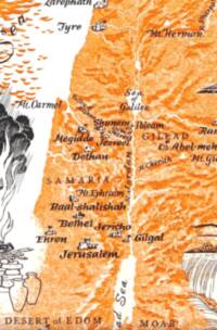 The map uses a two-color orange-and-dark-ink scheme with white reserved for watercourses, water bodies, and selected peak markers. Labels are hand-drawn or decorative serif styles, with italic mixed-case names for cities, rivers, water, and mountains, and spaced capitals for broad regions.