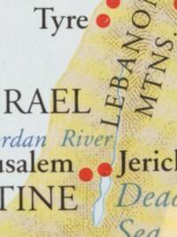 Close crop of the eastern Mediterranean coast uses warm yellow land, pale blue-gray water, dark serif labels, blue italic hydrographic labels, red circular city symbols, and brown stippled terrain shading.