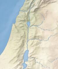 The map uses naturalistic shaded relief with blended landcover tints and blue hydrography.