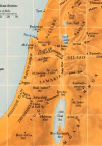 Orange hypsometric land tints dominate the map, with pale blue-gray water areas and a pale cream graticule drawn over both land and water.