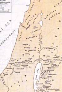Flat two-color sepia map with tan land, pale water, and dark brown labels and linework; many regional names are letter-spaced and rotated to follow their areas.