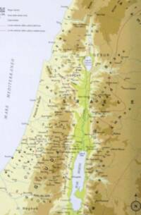 The map combines hypsometric elevation tints with large tribal and regional names, dense settlement labeling, pale blue water, green Jordan Valley watercourse styling, and red dashed boundary/limit lines.