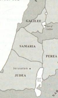 Monochrome flat map crop with gray land, white water, solid boundary lines, and dark brown-gray labeling.