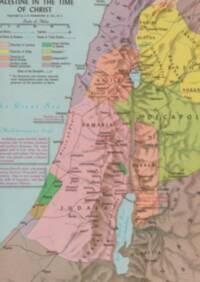 The map combines pastel political-area fills with shaded elevation texture; dark dashed networks show routes and territorial divisions, while water labeling and riverwork use pale blue-green ink.