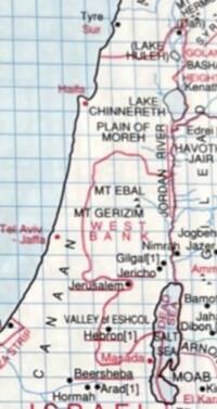 Flat full-color atlas style with pale blue water, an all-over square grid, off-white land, dark labels, and pink/red regional outlines and selected labels.